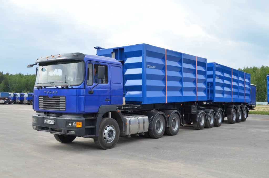 Зерновоз Тонар 95411 с боковой выгрузкой полуприцеп,полуприцепы,gjkeghbwtg,gjkeghbwtgs,тонар Москва